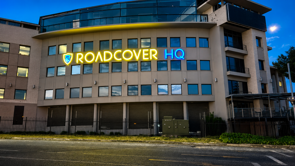 Illuminated RoadCover HQ signage on the company headquarters in Randburg, Johannesburg